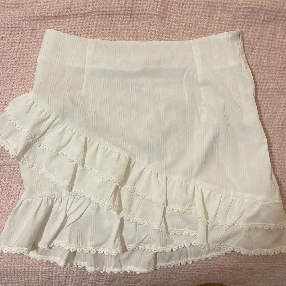 White asymmetrical mini skirt